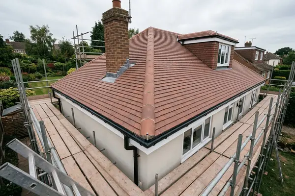 Illustration of a new roof being fitted